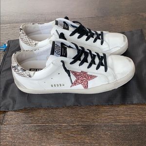 superstar sneakers in total black suede and snakeskin print leather